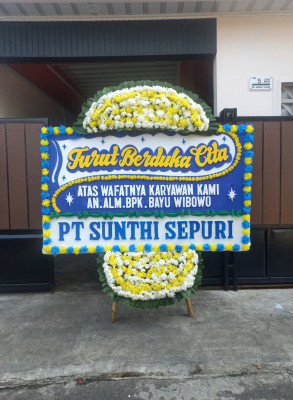 Papan Bunga Duka di Alai Gelombang