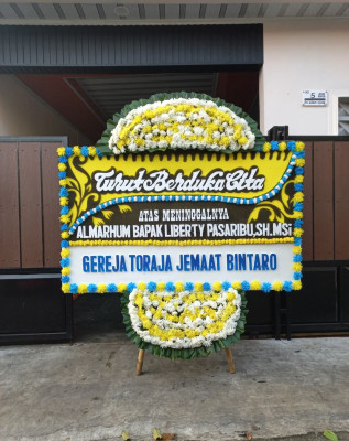 Papan Bunga Duka di Alai Gelombang