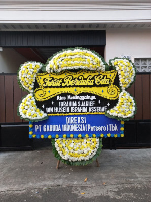 Papan Bunga Duka di Alai Gelombang